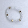 Gemstone white-topaz ring on spotted white marble background