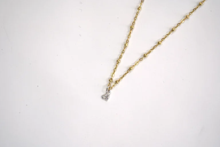 yellow gold filled hope necklace with a sterling silver authentic pendant on a white background