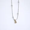 close up view sterling silver hope necklace with a14K yellow gold authentic pendant on a white background