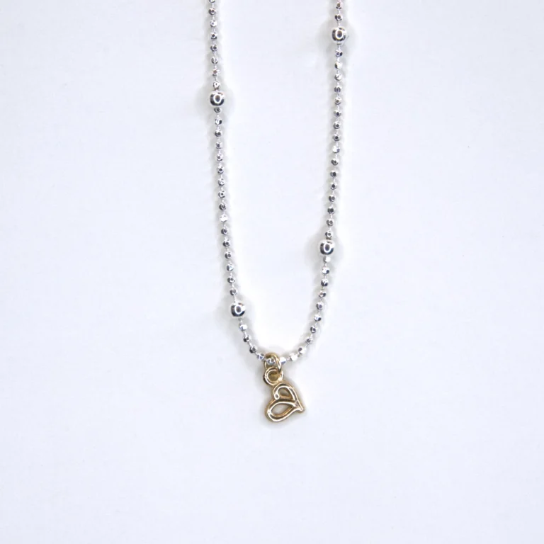 close up view sterling silver hope necklace with a14K yellow gold authentic pendant on a white background